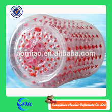 Transparent inflatable water roller with red dots, water filled lawn roller for fun